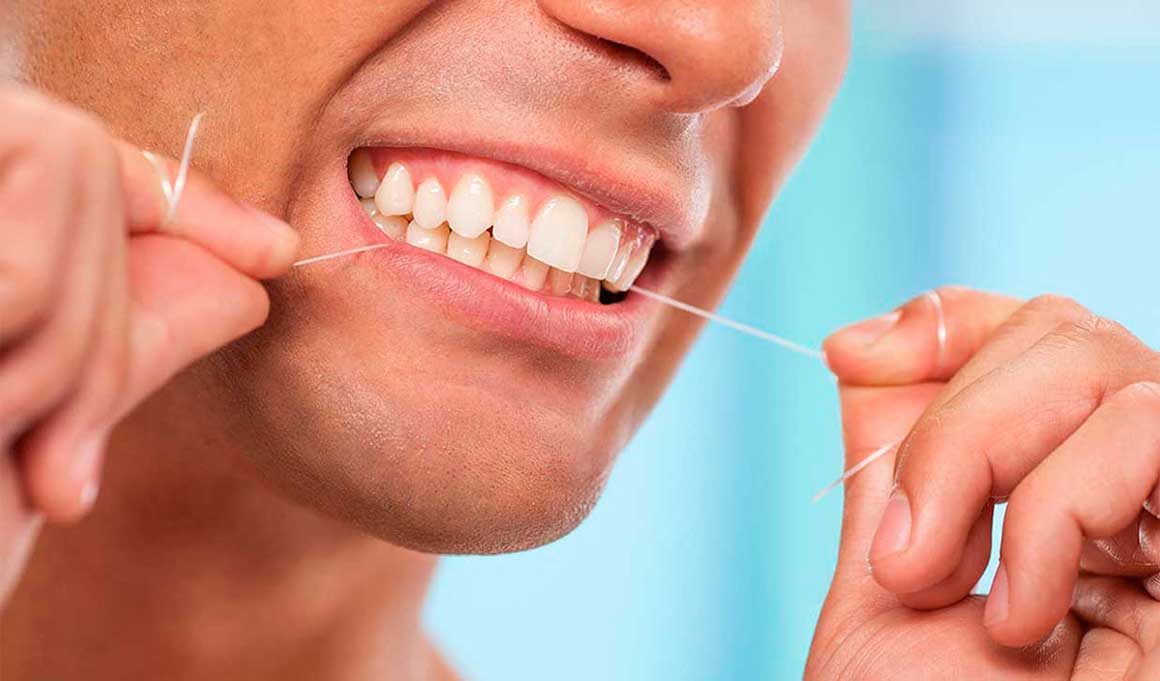 Как правильно пользоваться нитью для зубов